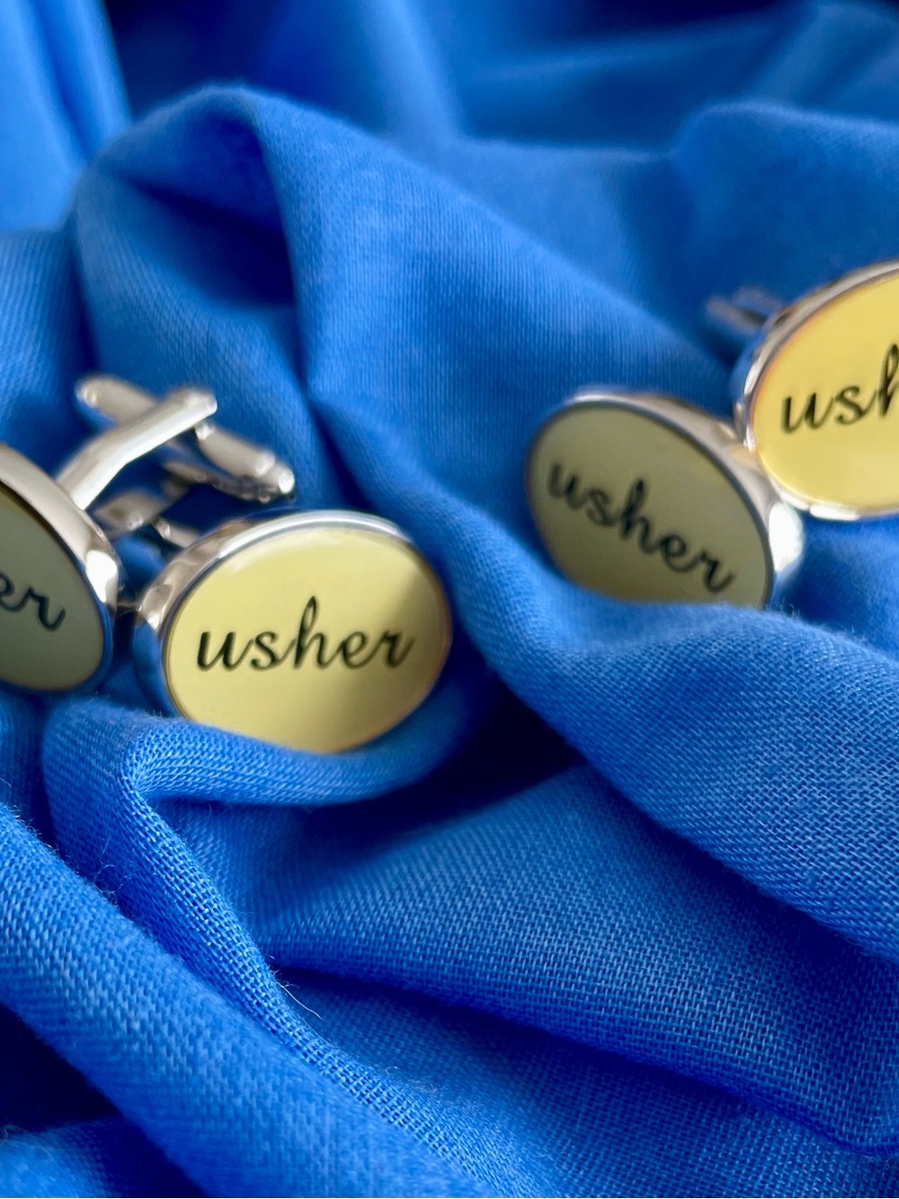 'Usher' Engraved Ivory Enamel Cufflinks, set of 2
